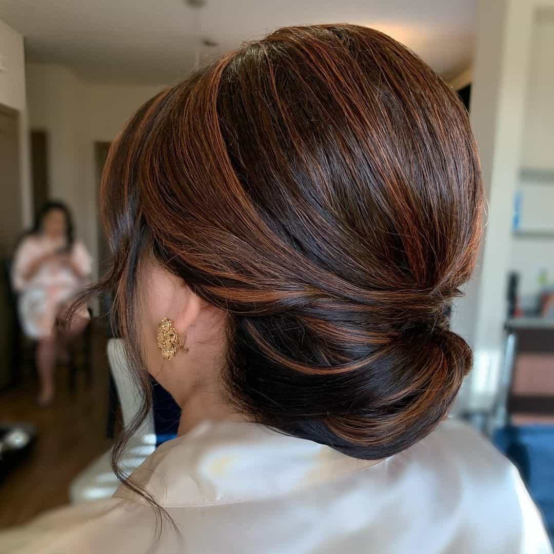 Low Bun Look With Highlights 