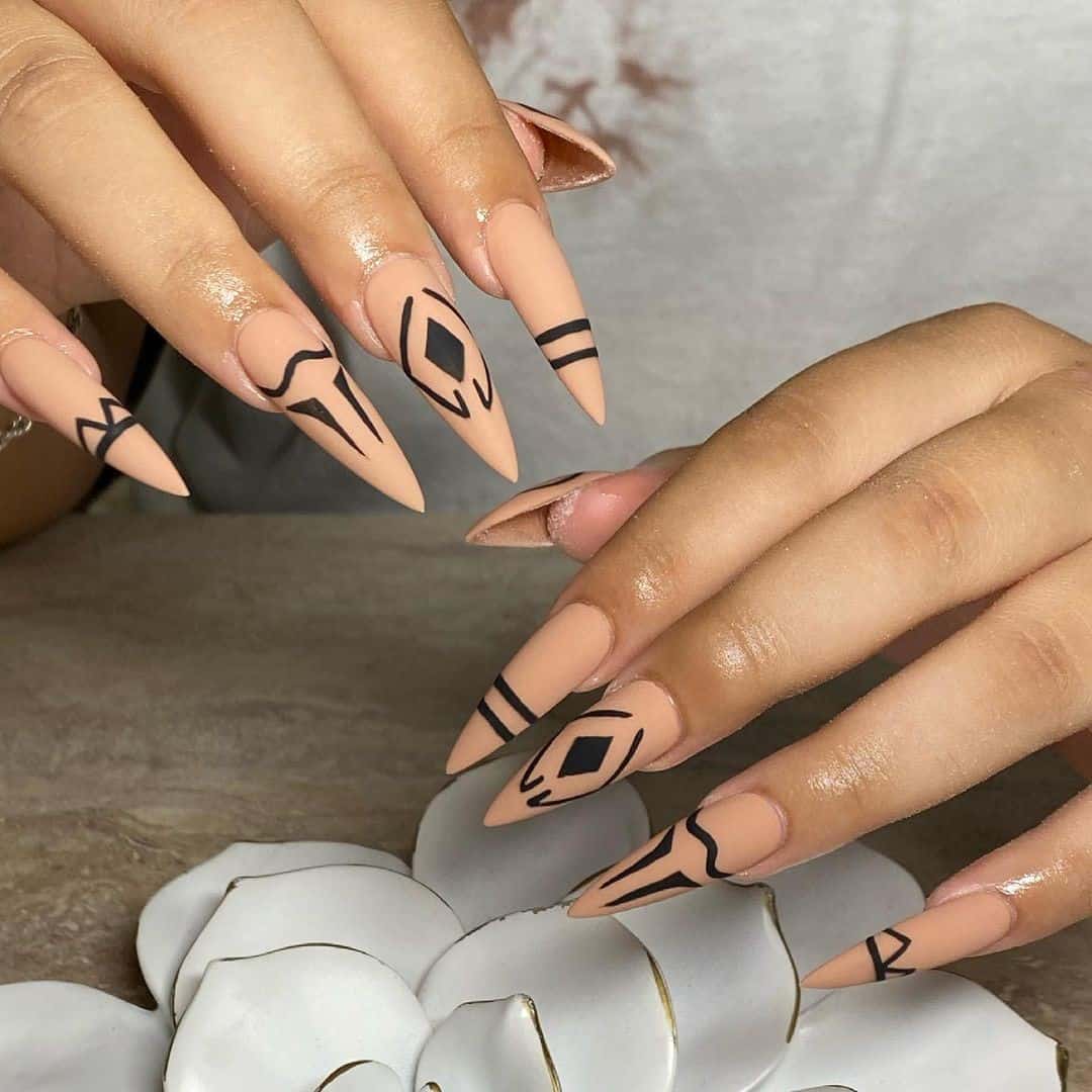 Tribal Inspired Nude Stiletto Nails 